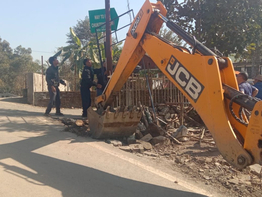 In this photo posted by Nagaland Congress on X, an excavator is seen clearing debris for the road in preparations to welcome Rahul Gandhi and the entourage of the Bharat Jodo Nyay Yatra accompanying him in Wokha district. (Photo Courtesy: @INCNagaland/X)